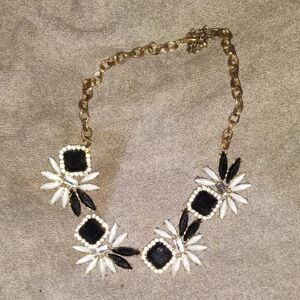 Elegant Gold and Black Floral Necklace